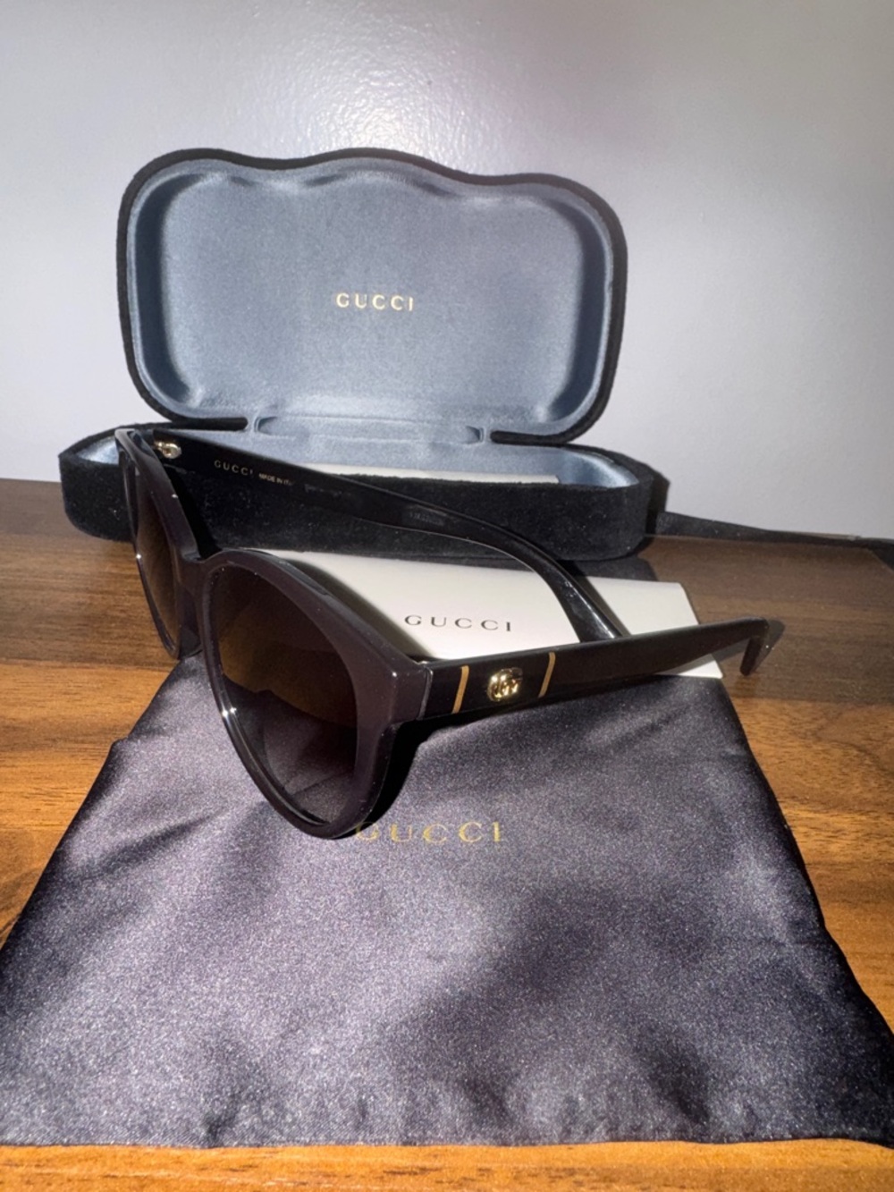 Gucci Women’s Black and Brown Cat-Eye Sunglasses with Gold Logo